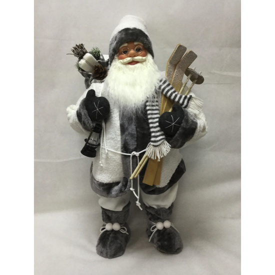 Père-Noel blanc avec ski et lanterne